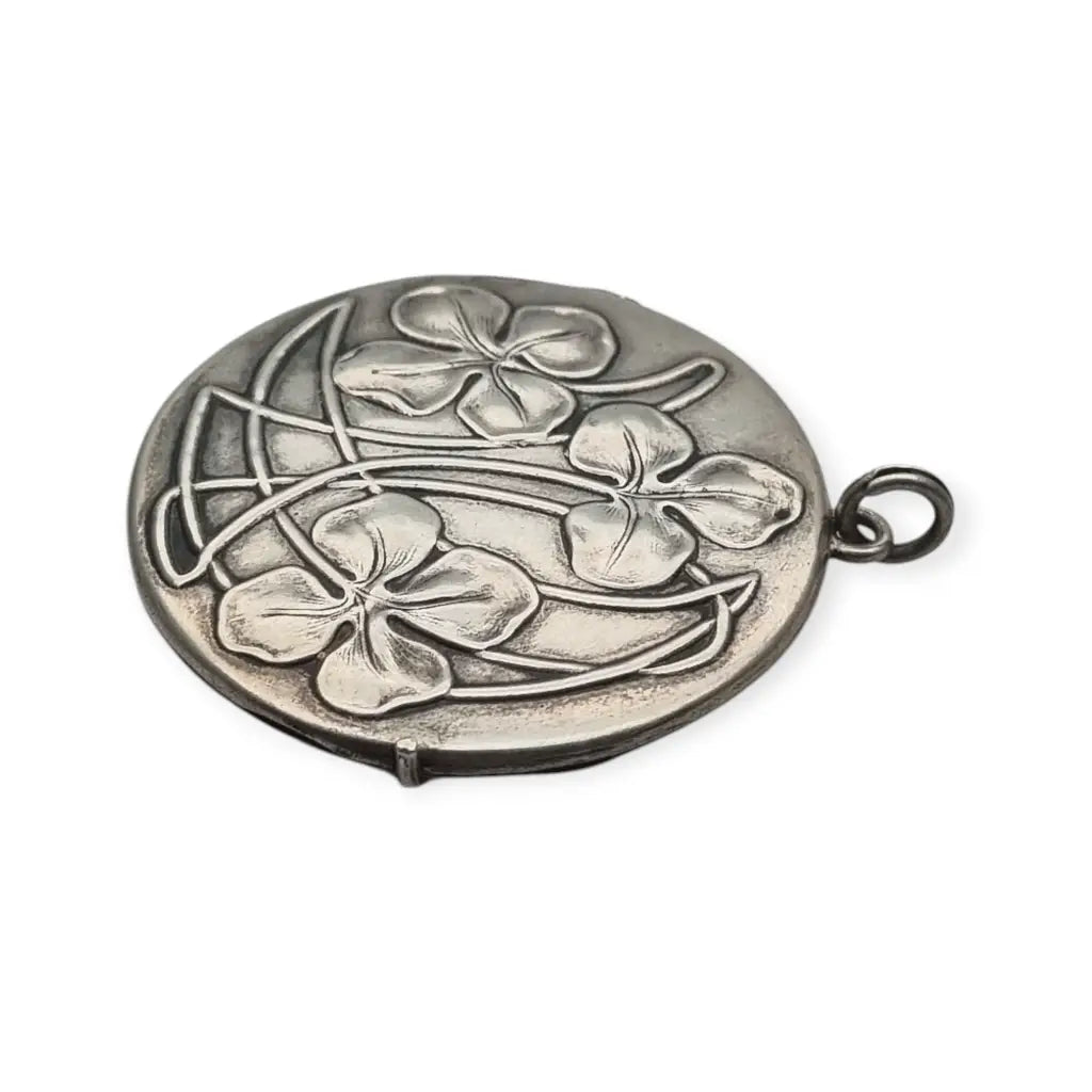 Guardapelo redondo Art Nouveau en plata 800 con flores. - LaBizarreSusu