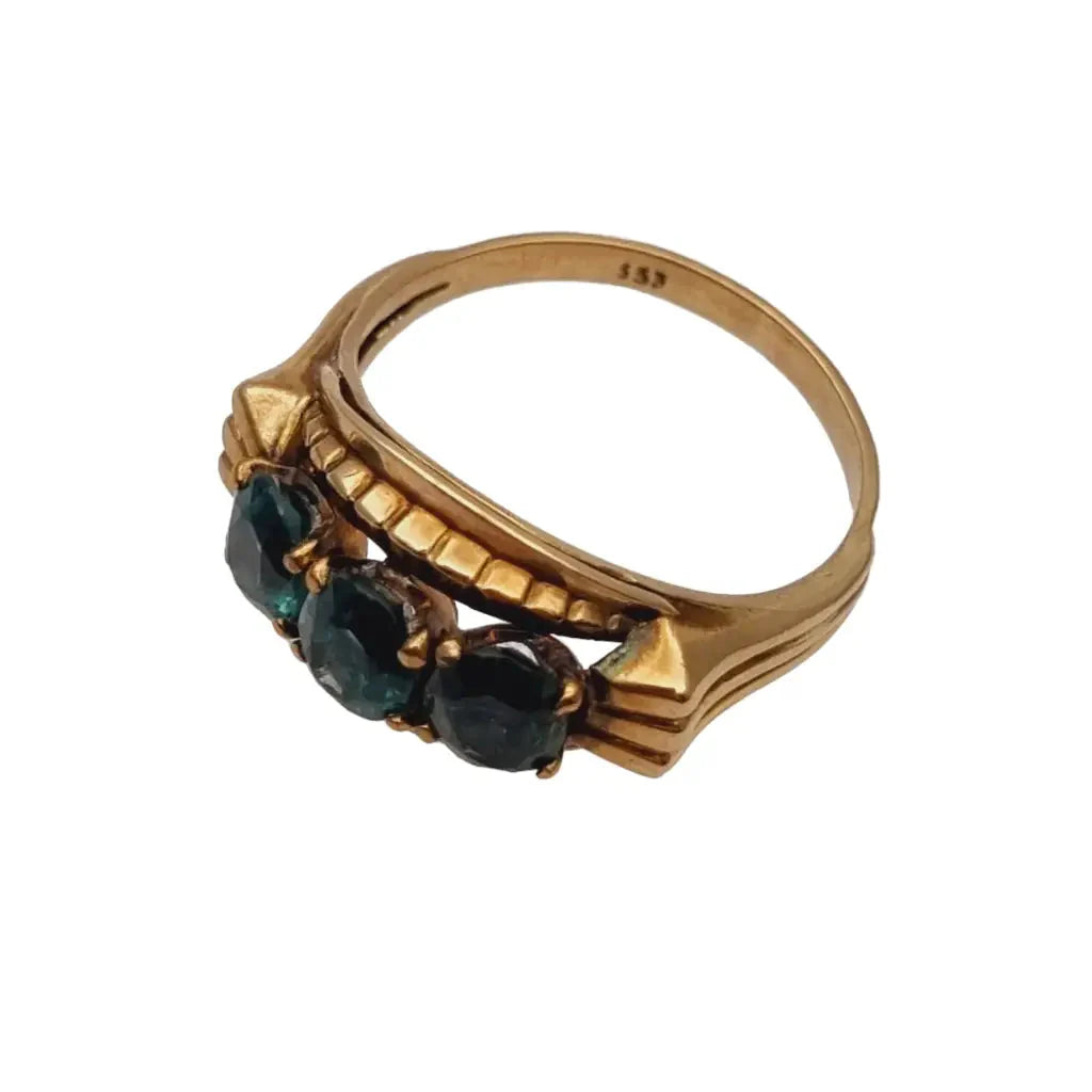 Anillo art déco de oro amarillo 8 kt. 333 piedra azul verdosa circa 1930.