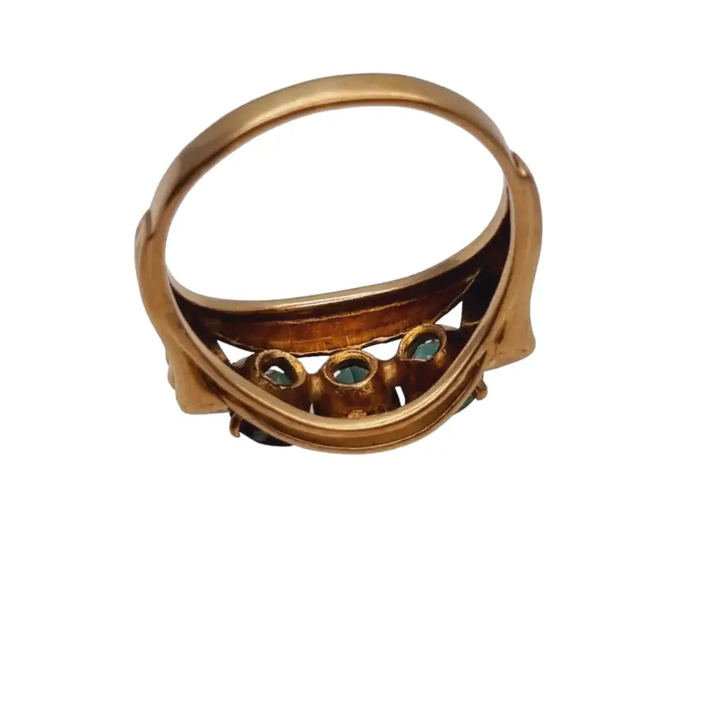 Anillo art déco de oro amarillo 8 kt. 333 piedra azul verdosa circa 1930.