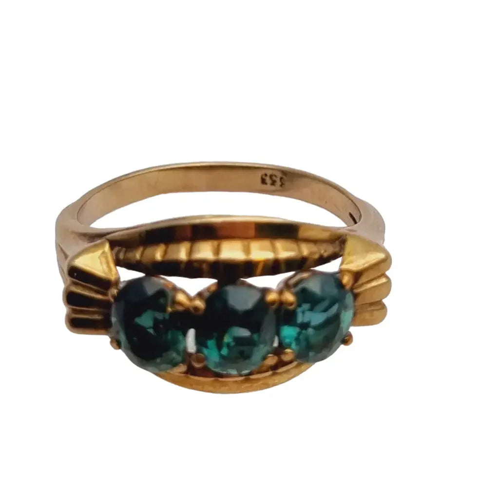 Anillo art déco de oro amarillo 8 kt. 333 piedra azul verdosa circa 1930.