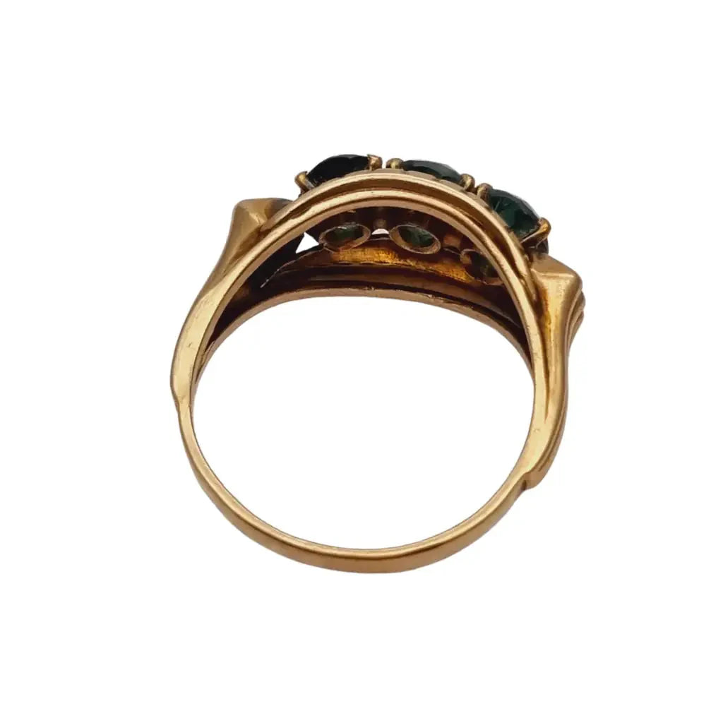 Anillo art déco de oro amarillo 8 kt. 333 piedra azul verdosa circa 1930.