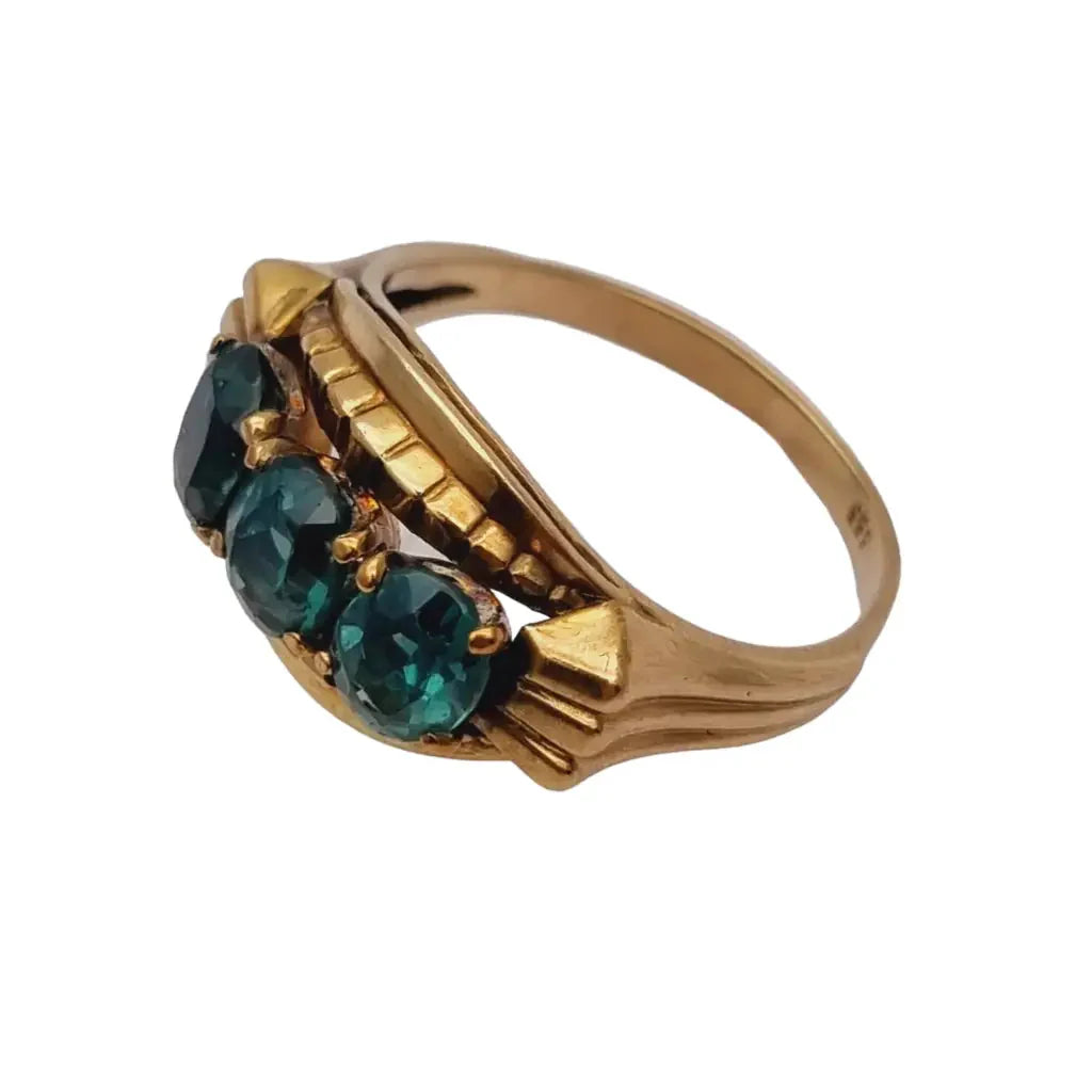Anillo art déco de oro amarillo 8 kt. 333 piedra azul verdosa circa 1930.