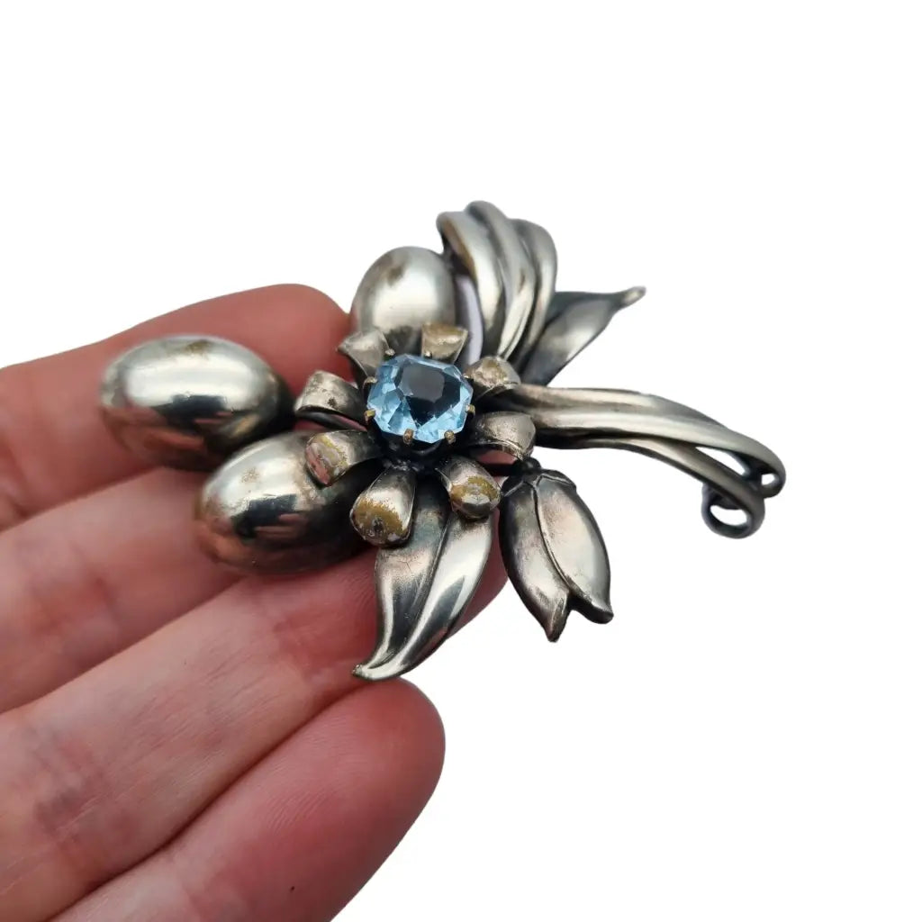 Broche grande de flor art deco vintage joyería flores pedrería azul.