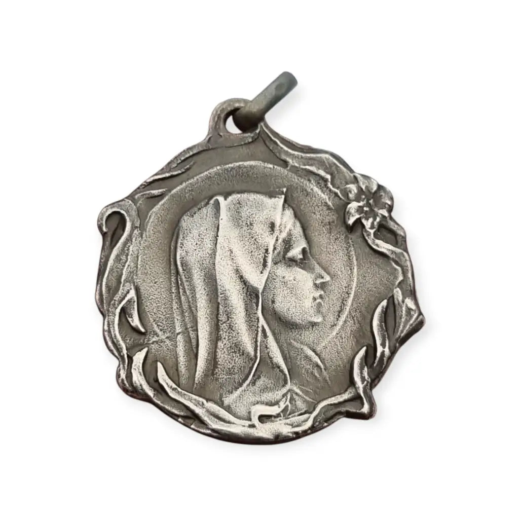 Medalla Art Nouveau antigua en plata con Virgen diseño floral religioso circa