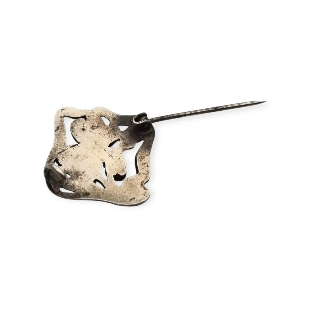 Pequeño Broche Art Nouveau en plata con flor iris relieve – joya floral