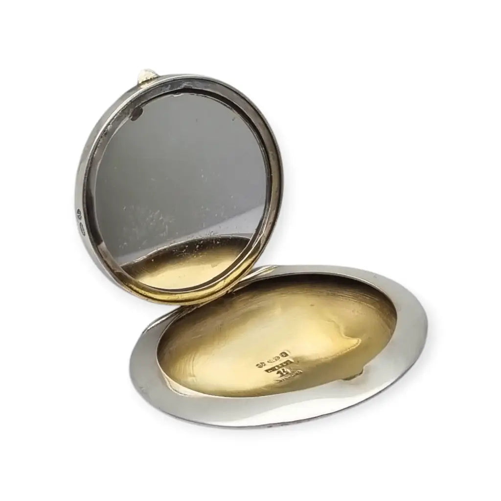 Polvera Art Déco en plata y esmalte guilloché morado Londres 1920 pieza