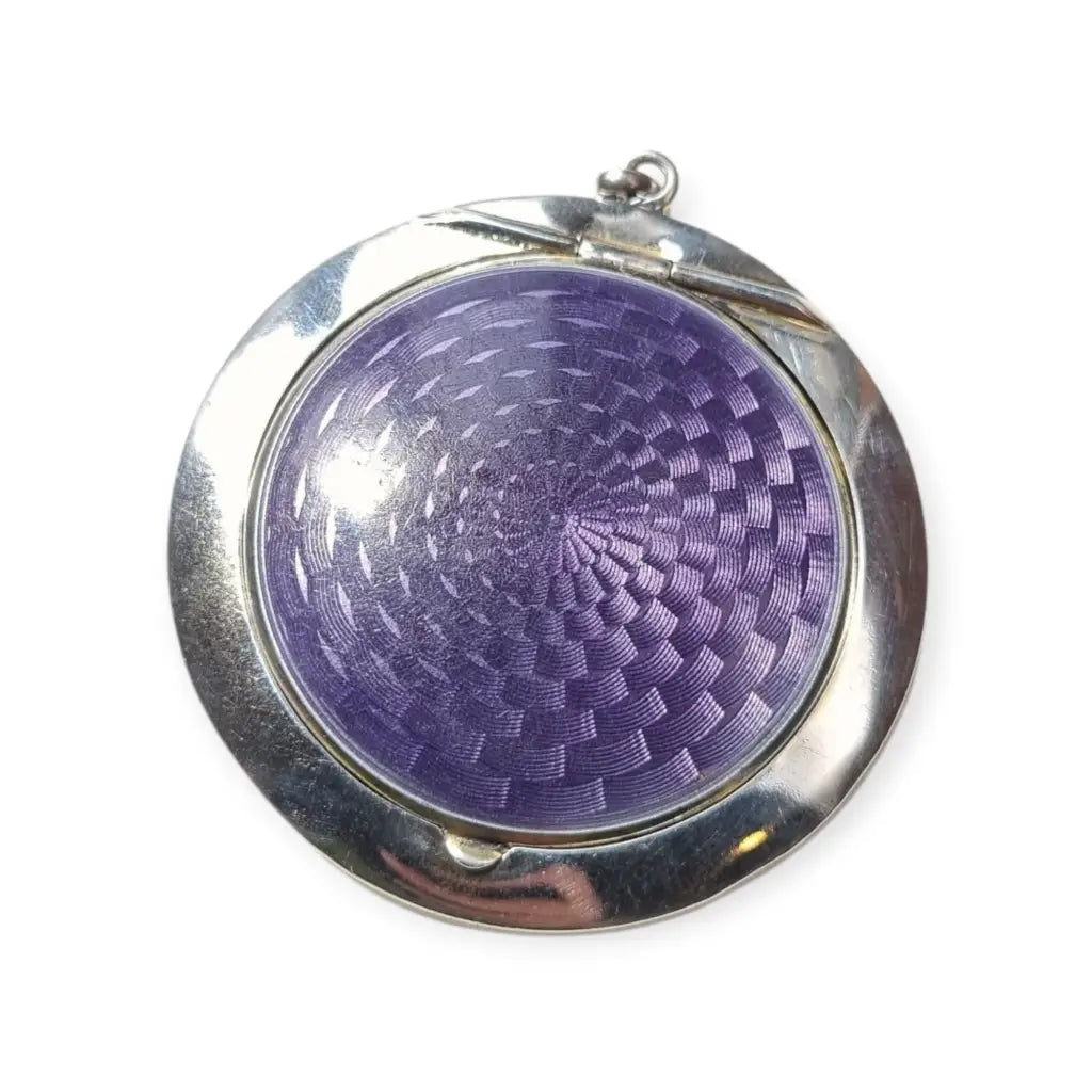 Polvera Art Déco en plata y esmalte guilloché morado Londres 1920 pieza