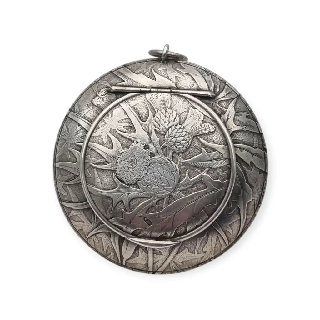 Polvera redonda de plata Art Nouveau con grabado cardos para coleccionista