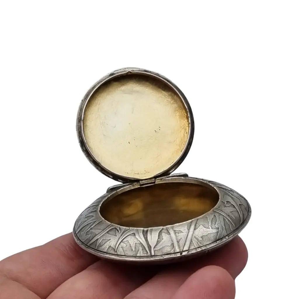 Polvera redonda de plata Art Nouveau con grabado cardos para coleccionista