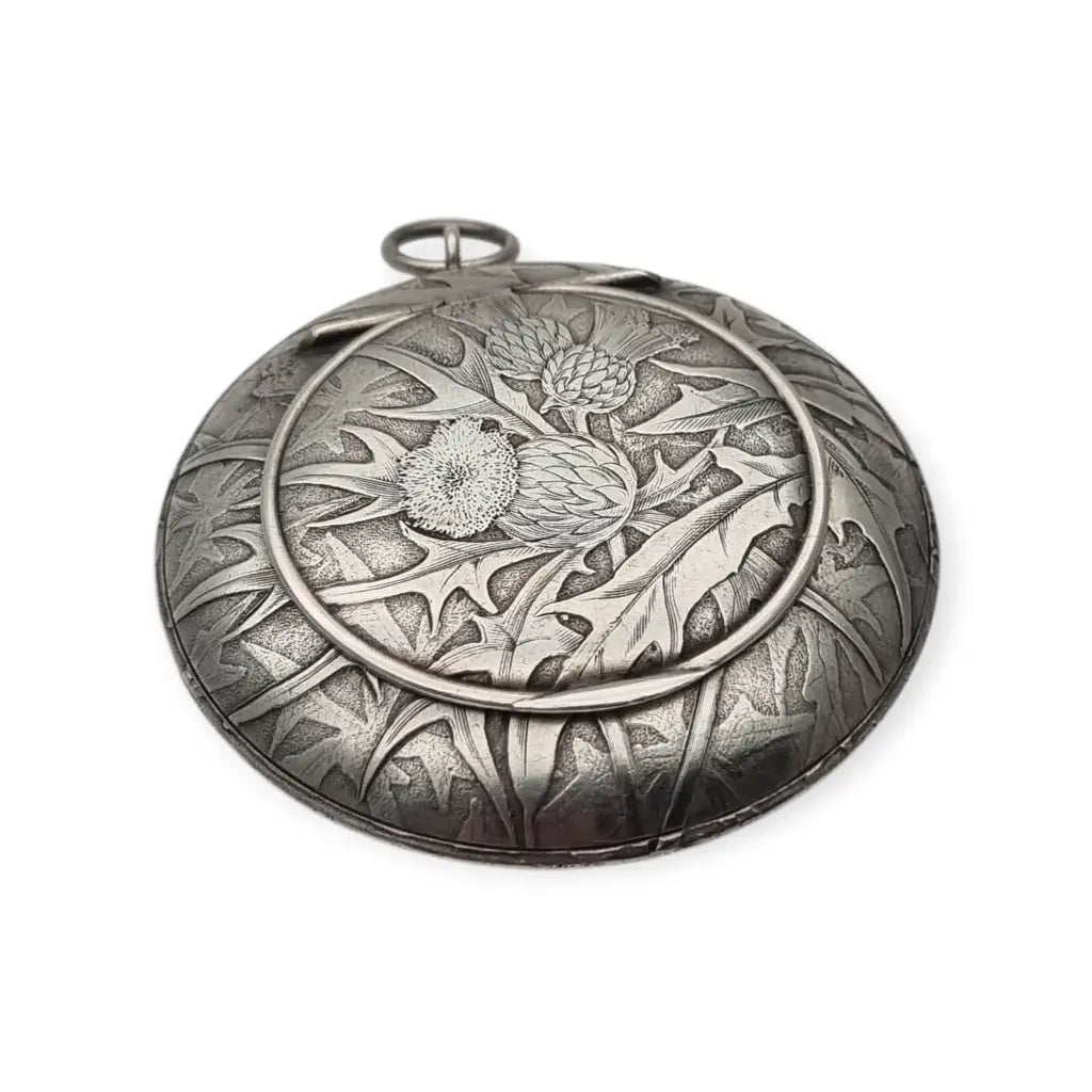 Polvera redonda de plata Art Nouveau con grabado cardos para coleccionista
