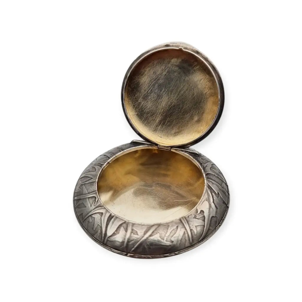 Polvera redonda de plata Art Nouveau con grabado cardos para coleccionista