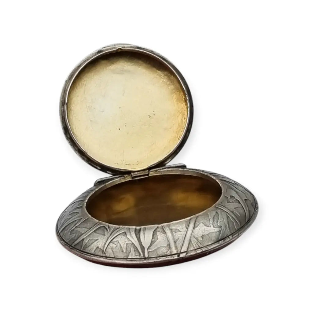 Polvera redonda de plata Art Nouveau con grabado cardos para coleccionista