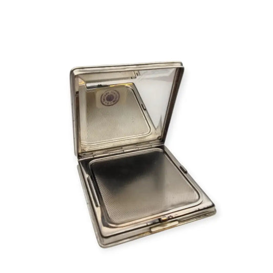 Polvera vintage años 50 en plata 925 con grabado estrellado y espejo interior.