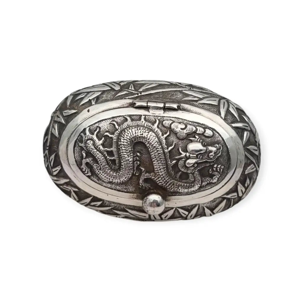 Rara caja de rapé oriental ovalada plata con dragón y bambú pieza