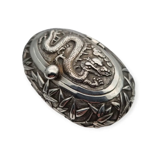 Rara caja de rapé oriental ovalada plata con dragón y bambú pieza