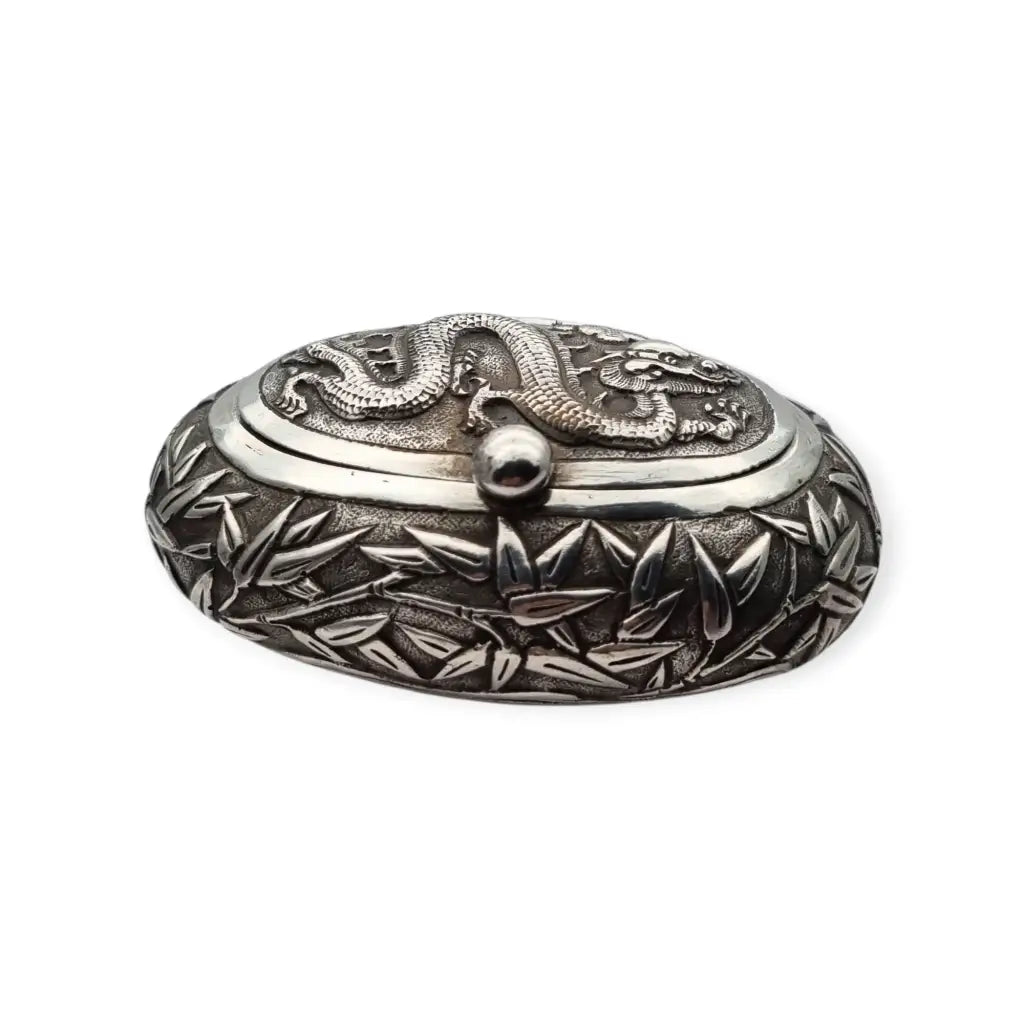 Rara caja de rapé oriental ovalada plata con dragón y bambú pieza