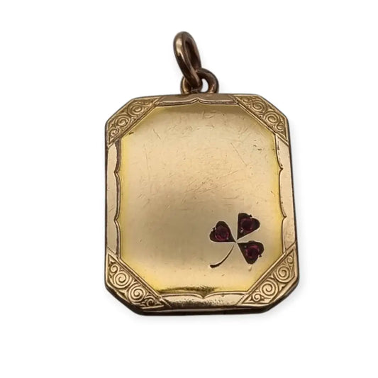 Relicario Art Déco gold filled con trébol de rubíes sintéticos colgante