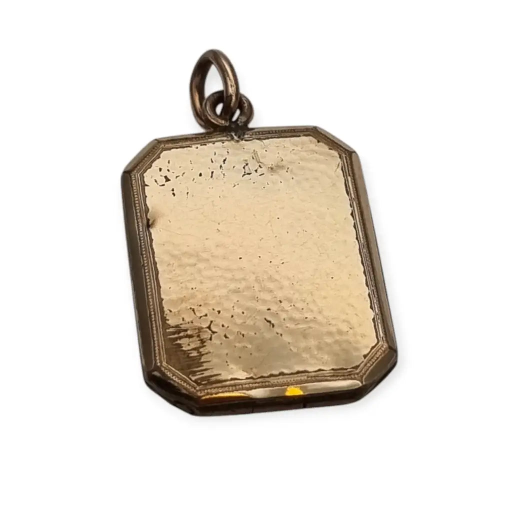 Relicario Art Déco gold filled con trébol de rubíes sintéticos colgante