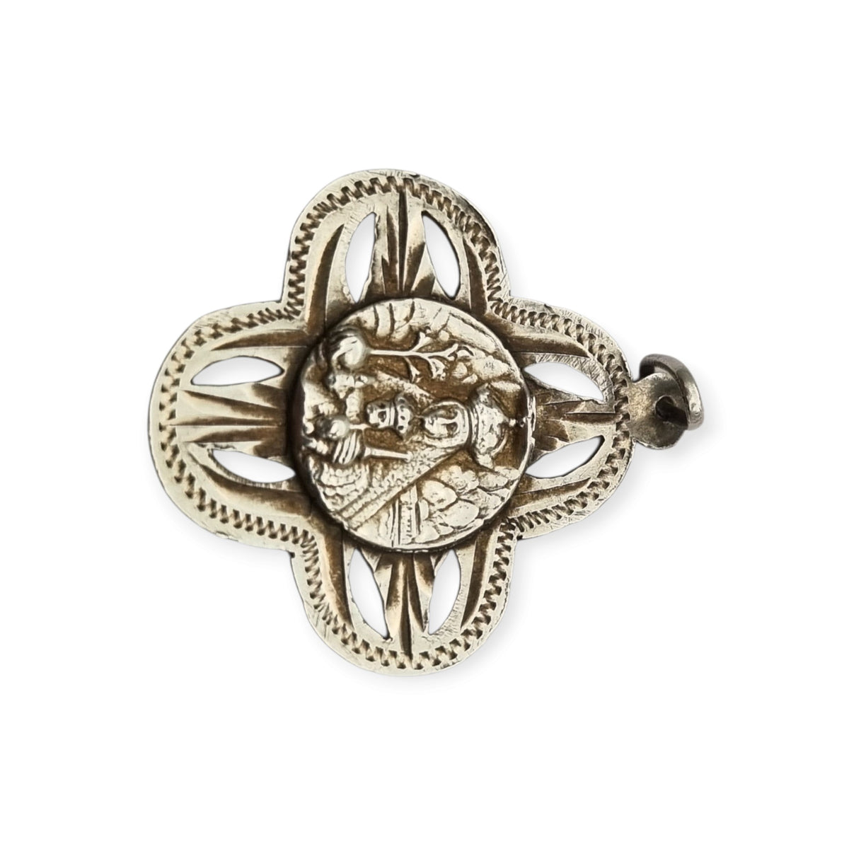 Medalla antigua de la Virgen de Montserrat en plata calada, recuerdo devocional catalán, ca. 1920-1950