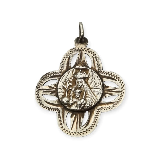 Antique openwork silver medal of the Virgin of Montserrat, Catalan devotional souvenir, ca. 1920-1950