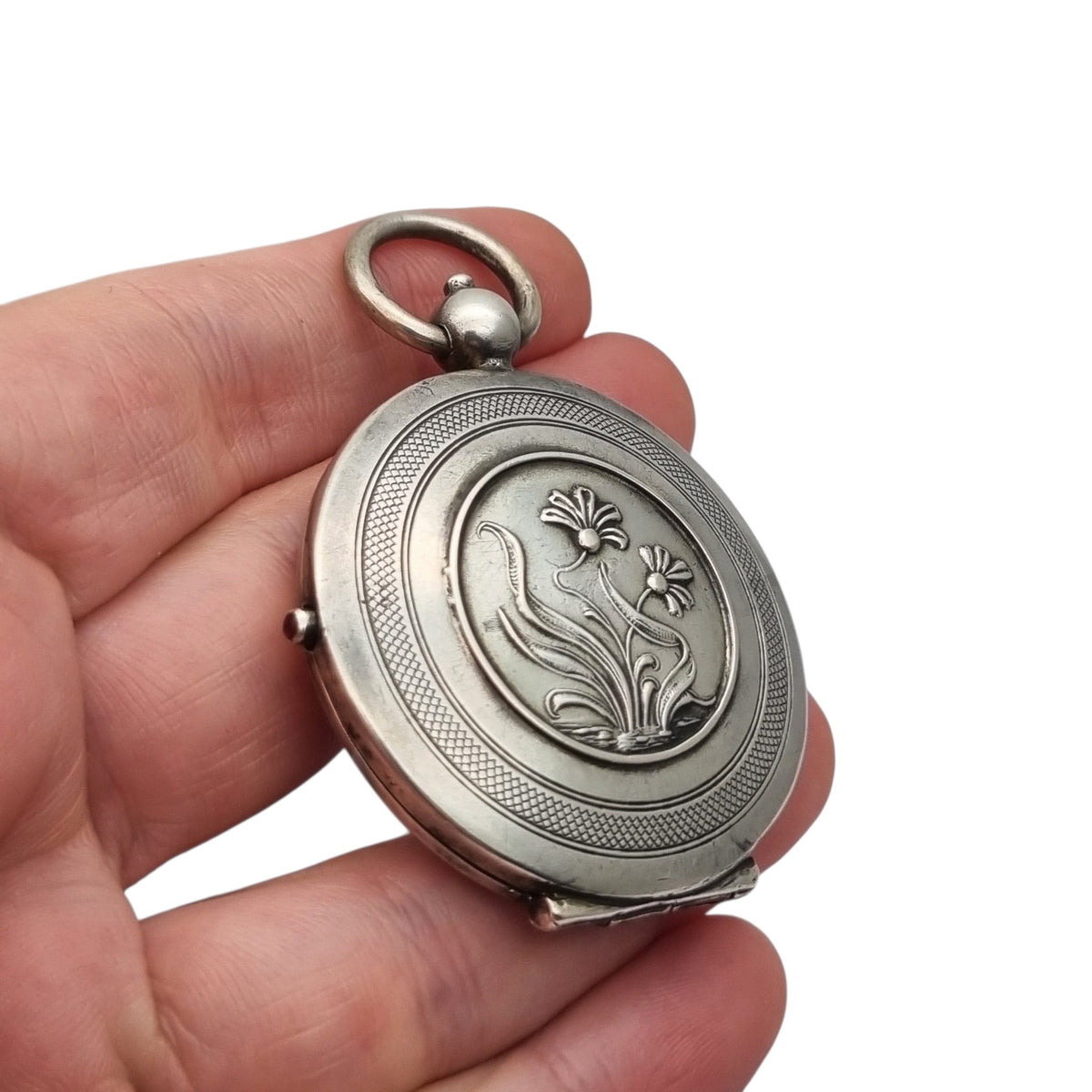 Antique Art Nouveau 800 silver locket with double photo frame, floral engraving, and pink stone, ca. 1900