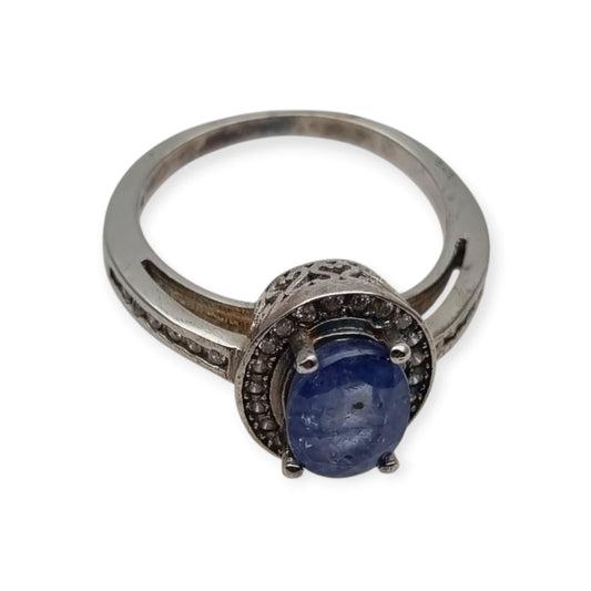 Anillo vintage de plata 925 con piedra azul estilo Diana y halo, circa 1990-2000