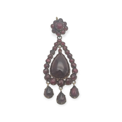 Colgante antiguo victoriano de pedrería granate y metal dorado, tipo girándola, circa 1900
