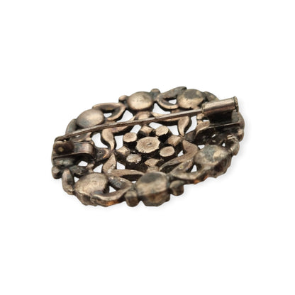 Broche vintage Art Déco de bisutería con pedrería y decoración floral, estilo Hollywood, Europa, ca. 1940–1950