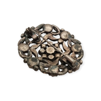Broche vintage Art Déco de bisutería con pedrería y decoración floral, estilo Hollywood, Europa, ca. 1940–1950