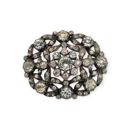 Broche vintage Art Déco de bisutería con pedrería y decoración floral, estilo Hollywood, Europa, ca. 1940–1950