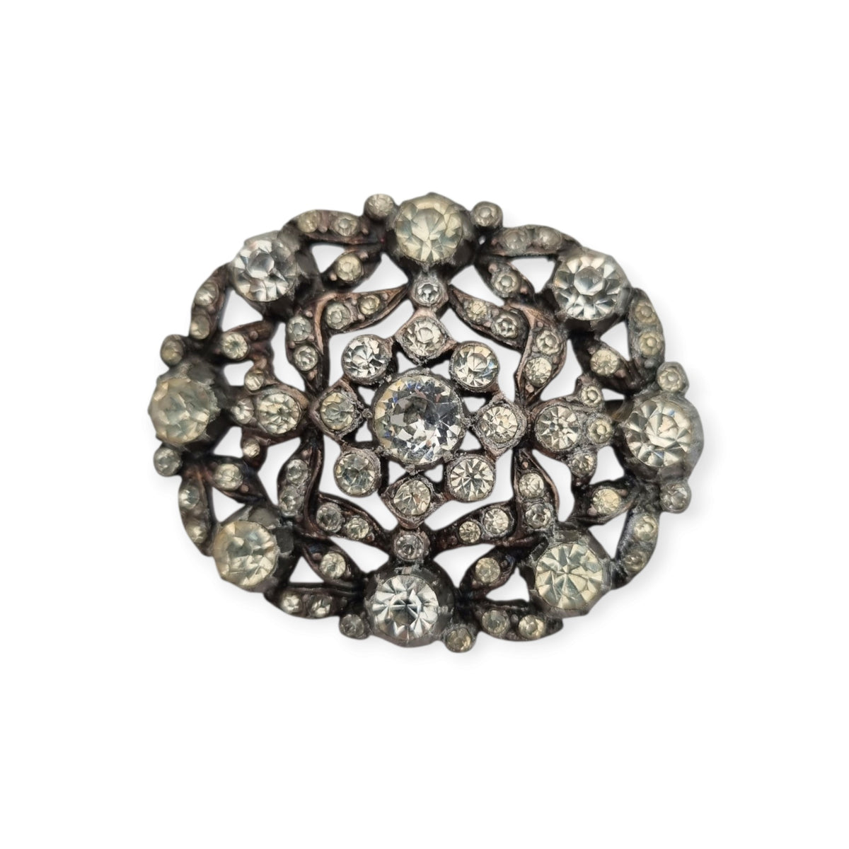 Broche vintage Art Déco de bisutería con pedrería y decoración floral, estilo Hollywood, Europa, ca. 1940–1950