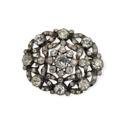 Broche vintage Art Déco de bisutería con pedrería y decoración floral, estilo Hollywood, Europa, ca. 1940–1950