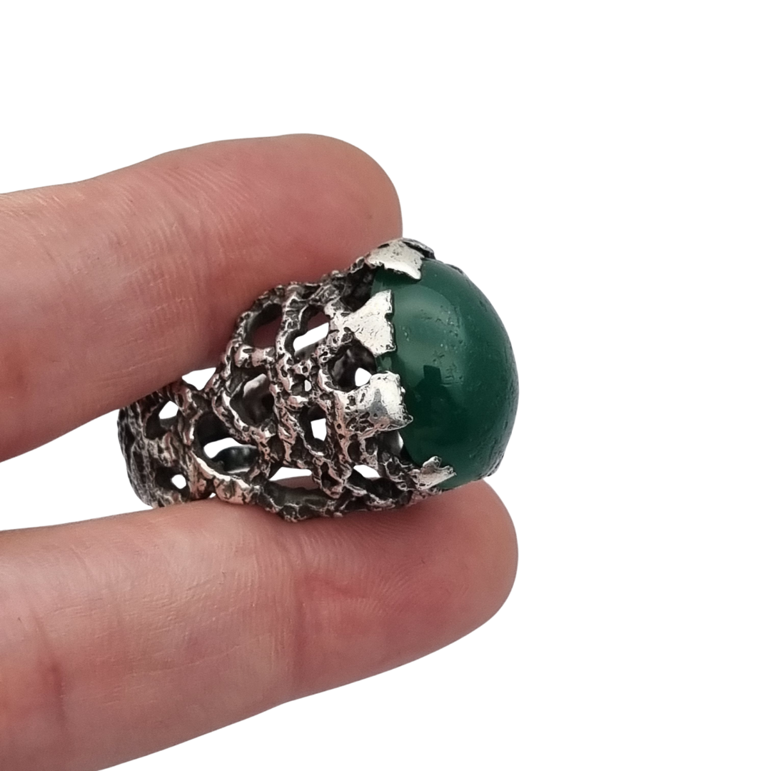 Brutalist textured silver ring with green cabochon organic design circa 1970