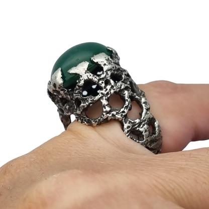 Brutalist textured silver ring with green cabochon organic design circa 1970