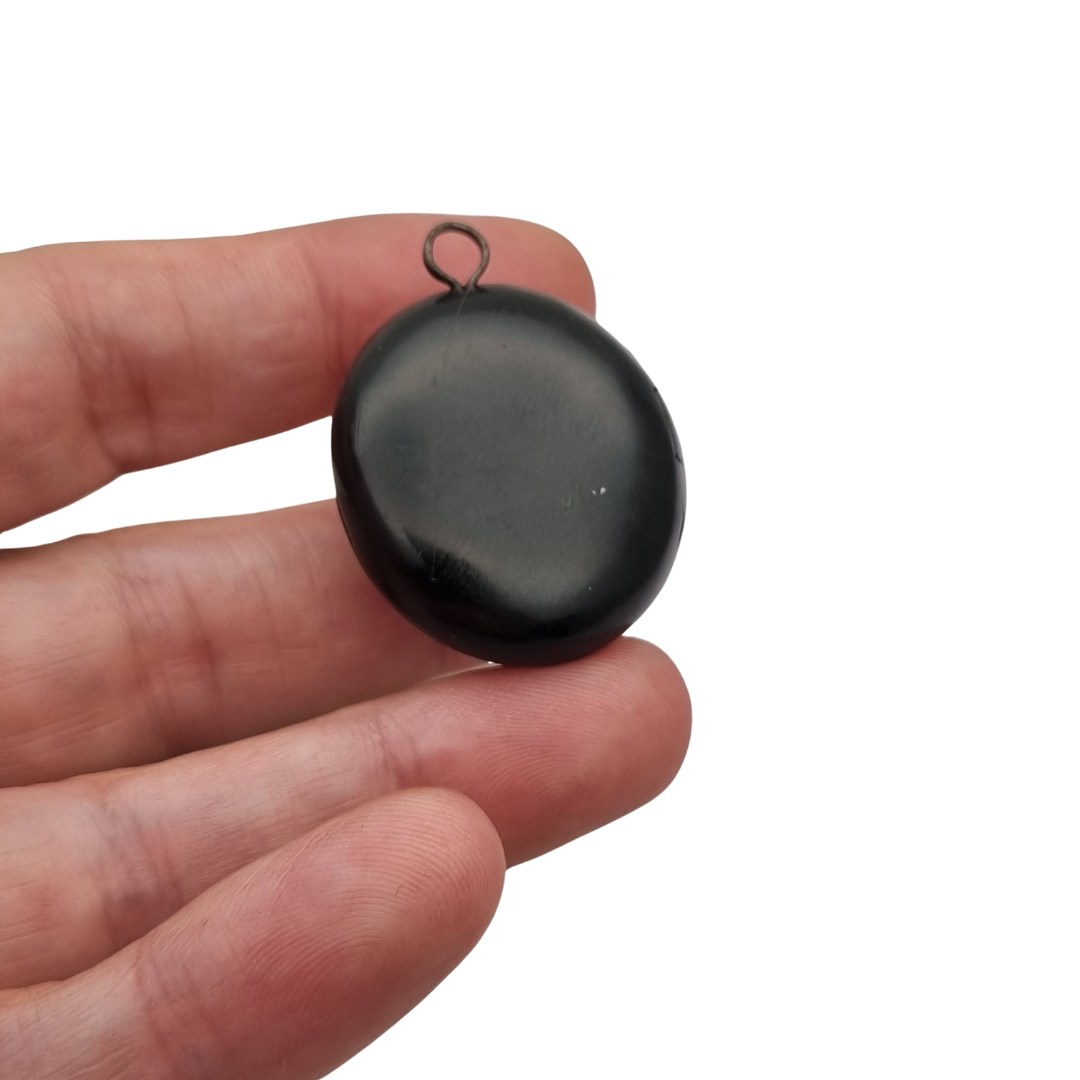 Antique Victorian vulcanite floral locket, circa 1880-1900, mourning jewelry