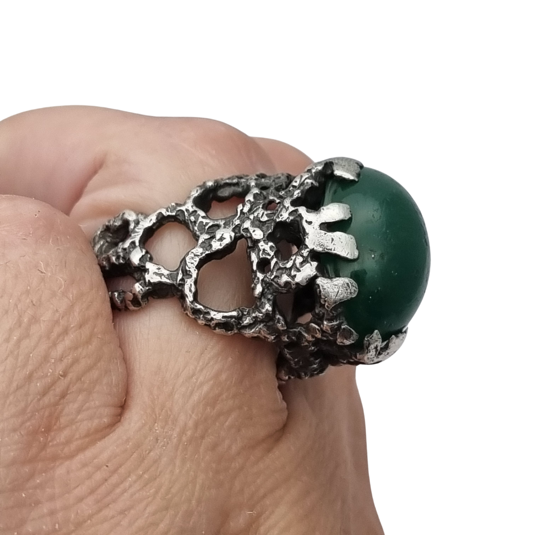 Brutalist textured silver ring with green cabochon organic design circa 1970