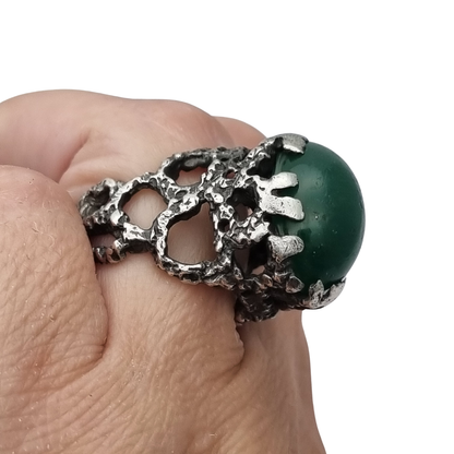Brutalist textured silver ring with green cabochon organic design circa 1970