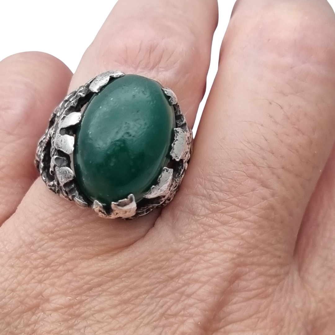 Brutalist textured silver ring with green cabochon organic design circa 1970