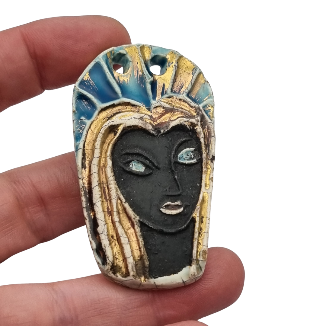 Handmade ceramic pendant with a Modernist Marian bust, enameled piece with golden highlights, European, 1960–1980s