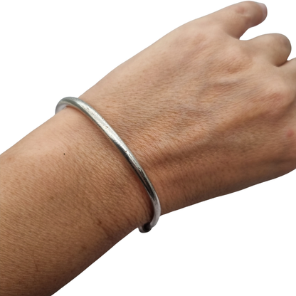 Vintage ethnic silver African knot bracelet, rigid artisan tribal bangle, 20th century