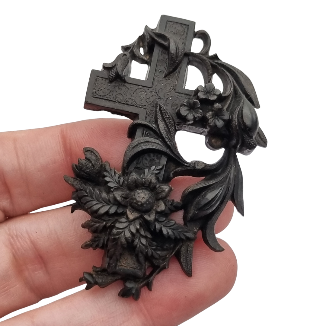 Victorian vulcanite mourning brooch, cross with ivy and flowers, England, circa 1880-1900