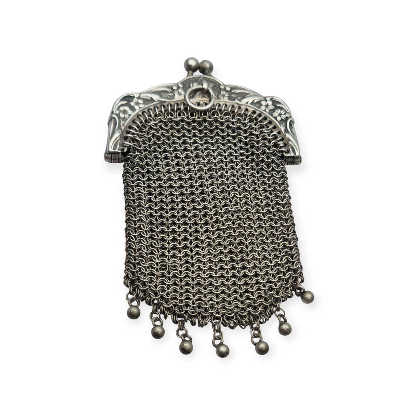 Monedero Art Nouveau en plata con boquilla floral repujada, circa 1900