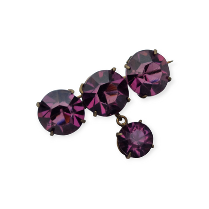 Broche antiguo en latón con strass morado facetado colgante, circa 1930