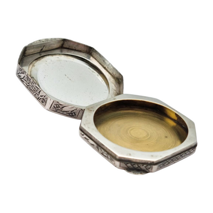 Antique octagonal powder compact in 800 silver engraved with butterflies and flowers, circa 1950