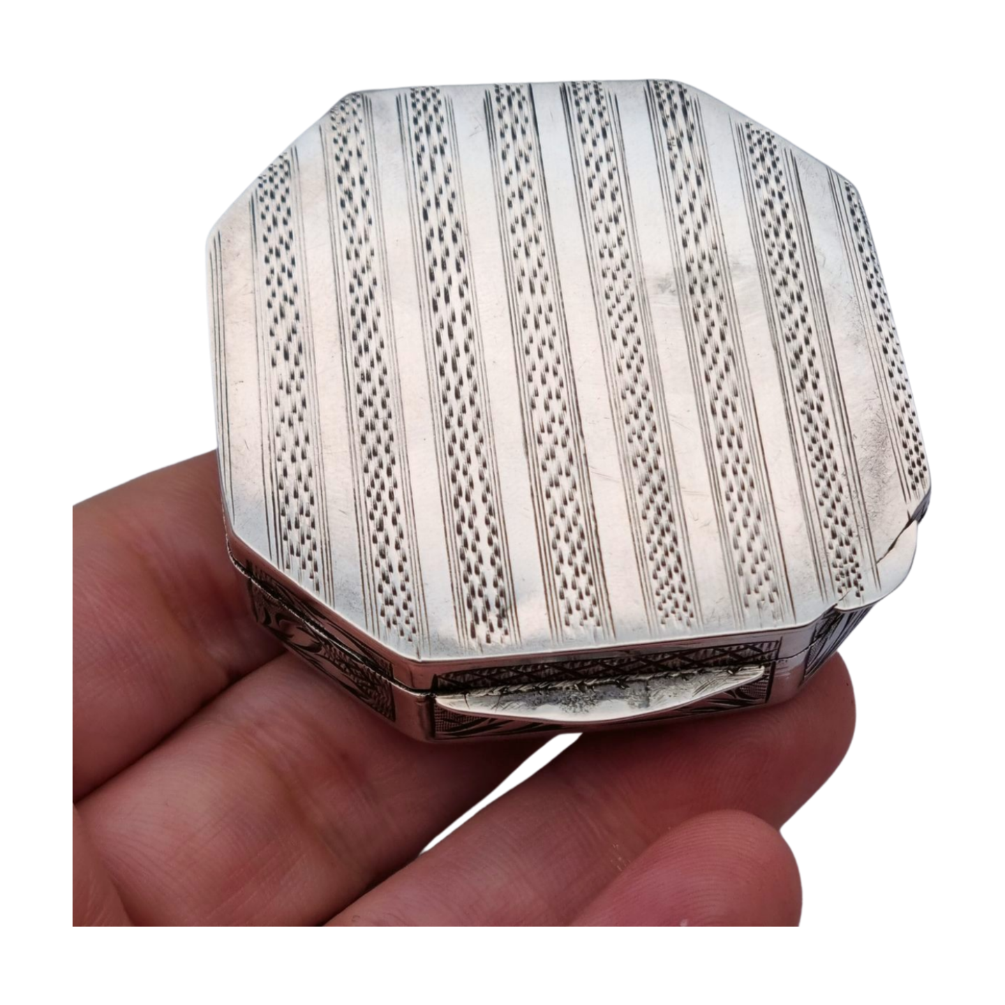 Antique octagonal powder compact in 800 silver engraved with butterflies and flowers, circa 1950