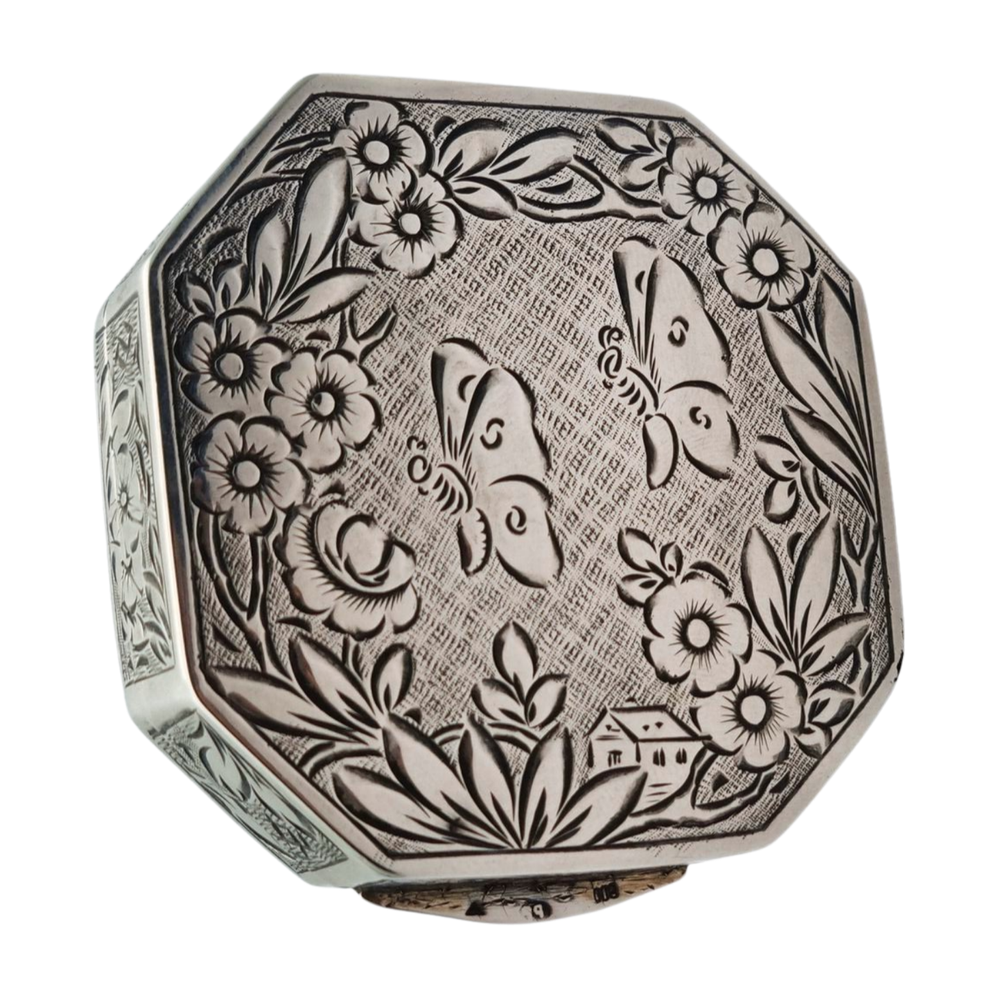 Antique octagonal powder compact in 800 silver engraved with butterflies and flowers, circa 1950