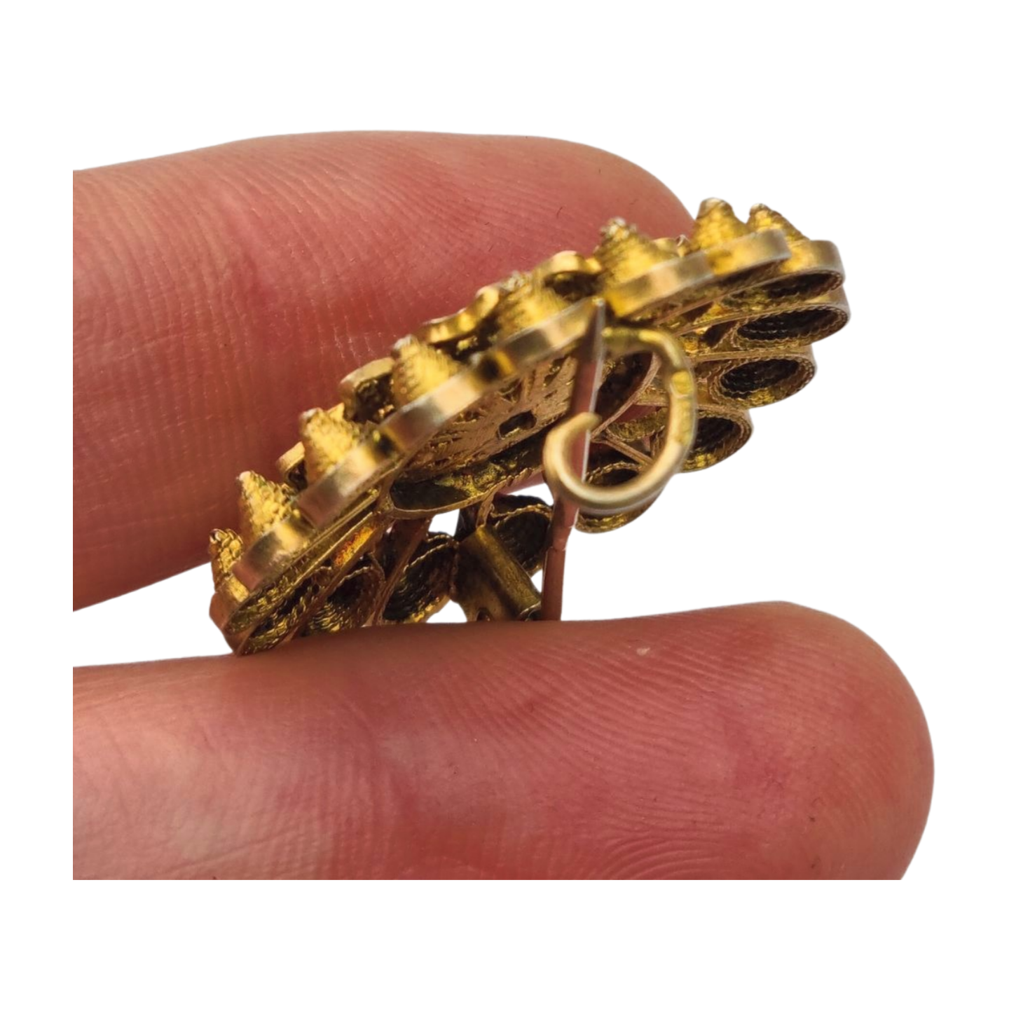 Broche floral años 30-40 en plata dorada con cristal azul y filigrana oriental