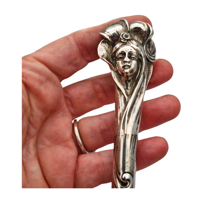 Jugendstil silver umbrella handle with female face circa 1900