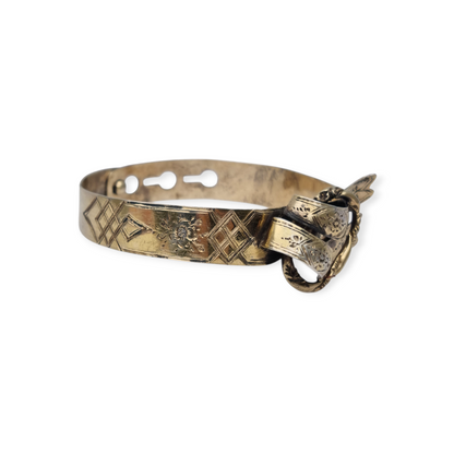 European Victorian bracelet in gilt silver with floral engraving and central bow, late 19th century