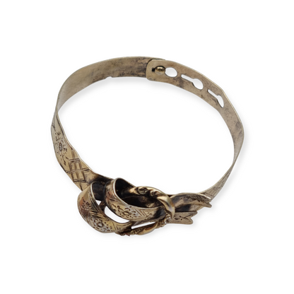 European Victorian bracelet in gilt silver with floral engraving and central bow, late 19th century